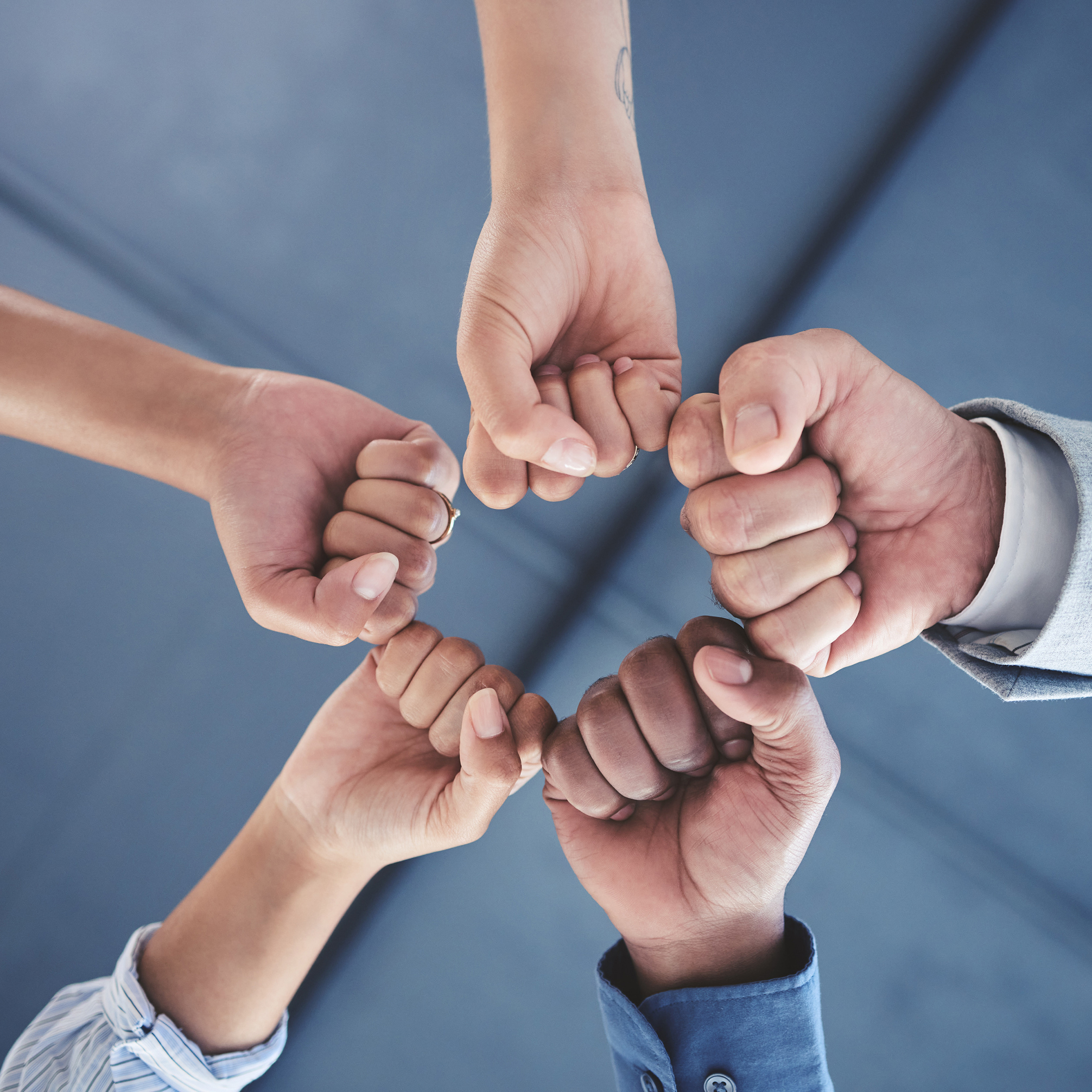 Team success and motivation fist bump of business people with te